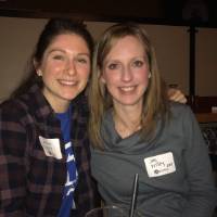 Two alumni posing for picture